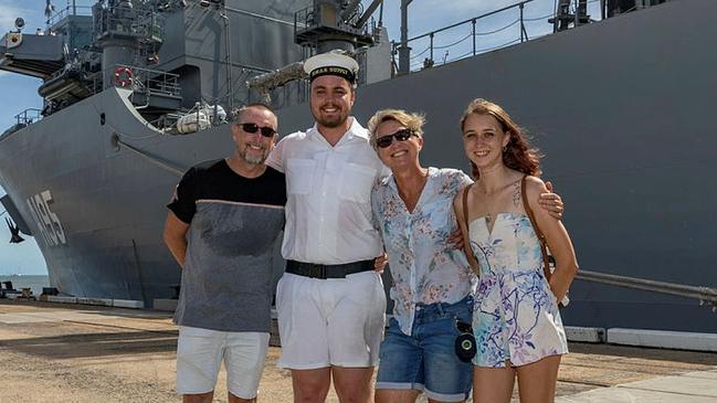 Cairns local, Able Seaman Maritime Logistics Supply Chain Kurt Kenny is welcomed home by his family (left to right) Chris Kenny, Christina Kenny and Alana Kenny during HMAS Supply's first port visit to Cairns, Queensland. Picture: Supplied