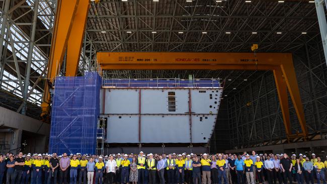 BAE Systems Australia workers at Osborne Naval Shipyard with Premier Peter Malinauskas and now-chief executive Craig Lockhart. Photo: Naomi Jellicoe