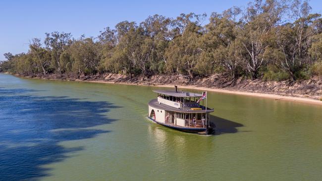 A paddle steamer makes its way up the Murray River near Echuca-Moama.