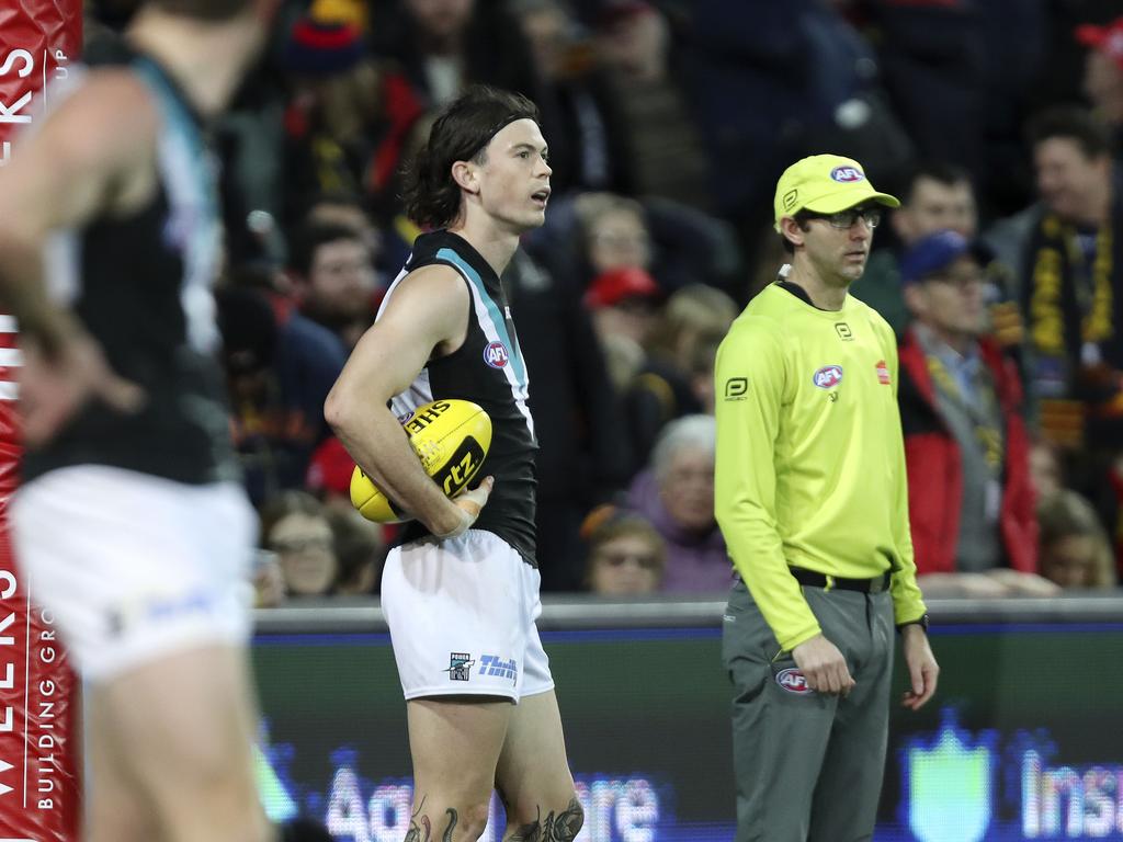 04/08/18 - AFL - Showdown 45 - Adelaide Crows v Port Adelaide at Adelaide Oval. Jasper Pittard waits for the score review on Josh Jenkins winning goal. Picture SARAH REED