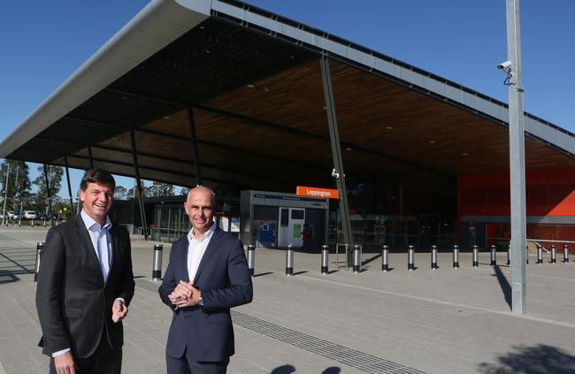Hume MP Angus Taylor and Camden MP Chris Patterson at Leppington Station. Picture: Ian Svegovic
