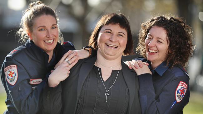 Eve Sabine, 29,  was reunited with saviours paramedics Kelly Smith and Aliex Kay. Picture: Alex Coppel