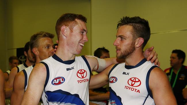 Brodie Smith, right, celebrates with teammate Tom Lynch after the win over Collingwood. Picture: Wayne Ludbey