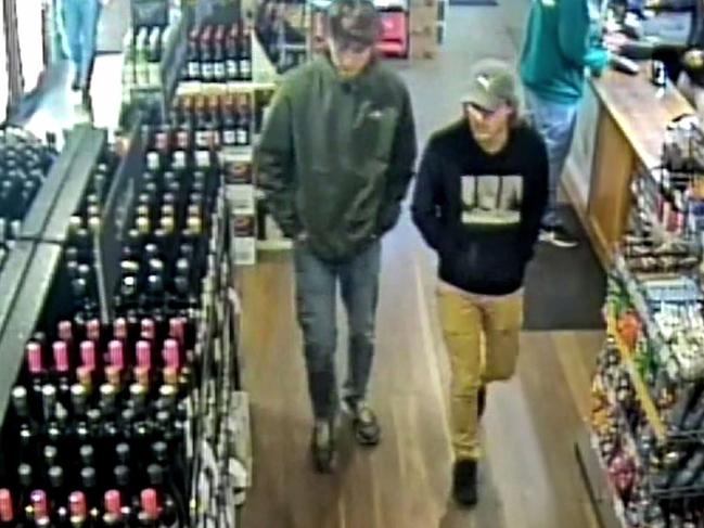 Missing Belgian tourist Theo Hayez (right) in a bottle shop in the coastal tourist town of Byron Bay before his disappearance on May 31. Picture: Supplied