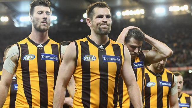 Hawthorn players leave the MCG. Picture: Getty Images