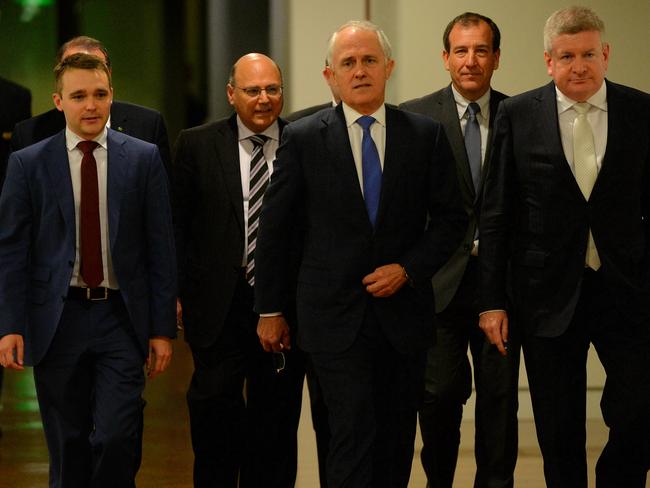 Malcolm Turnbull, centre, arrives with his supporters, September 14, 2015. Picture: AAP Image/Sam Mooy