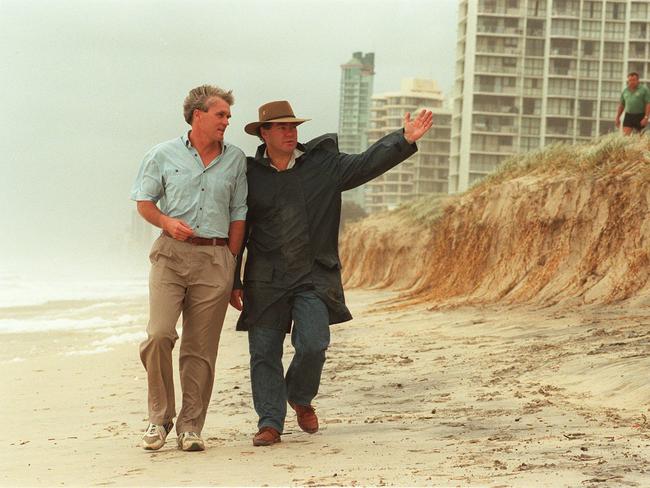 Chief Director of Engineering Services Warren Day (L) and Mayor Ray Stevens inspect damage at Main Beach Gold Coast. in 1996.