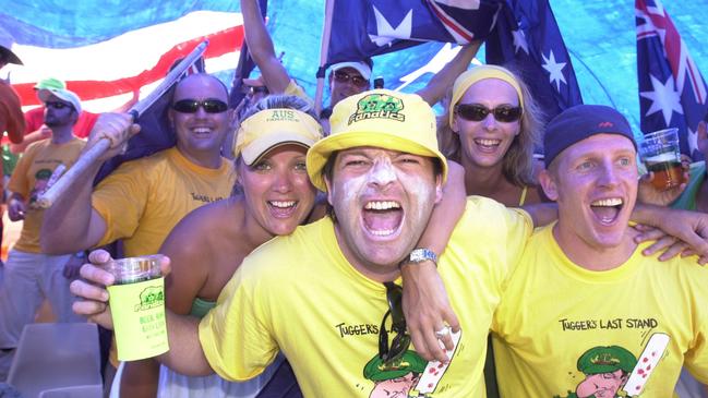 Fanatics president Warren Livingstone, centre, with friends at the SCG. Picture: Craig Greenhill