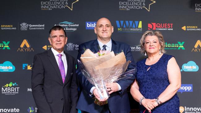 Cr Mike Charlton with Solar Bollar Lighting managing director Michael Arieni and RDA Moreton Bay's Nette Griggs. Photo: Dominika Lis