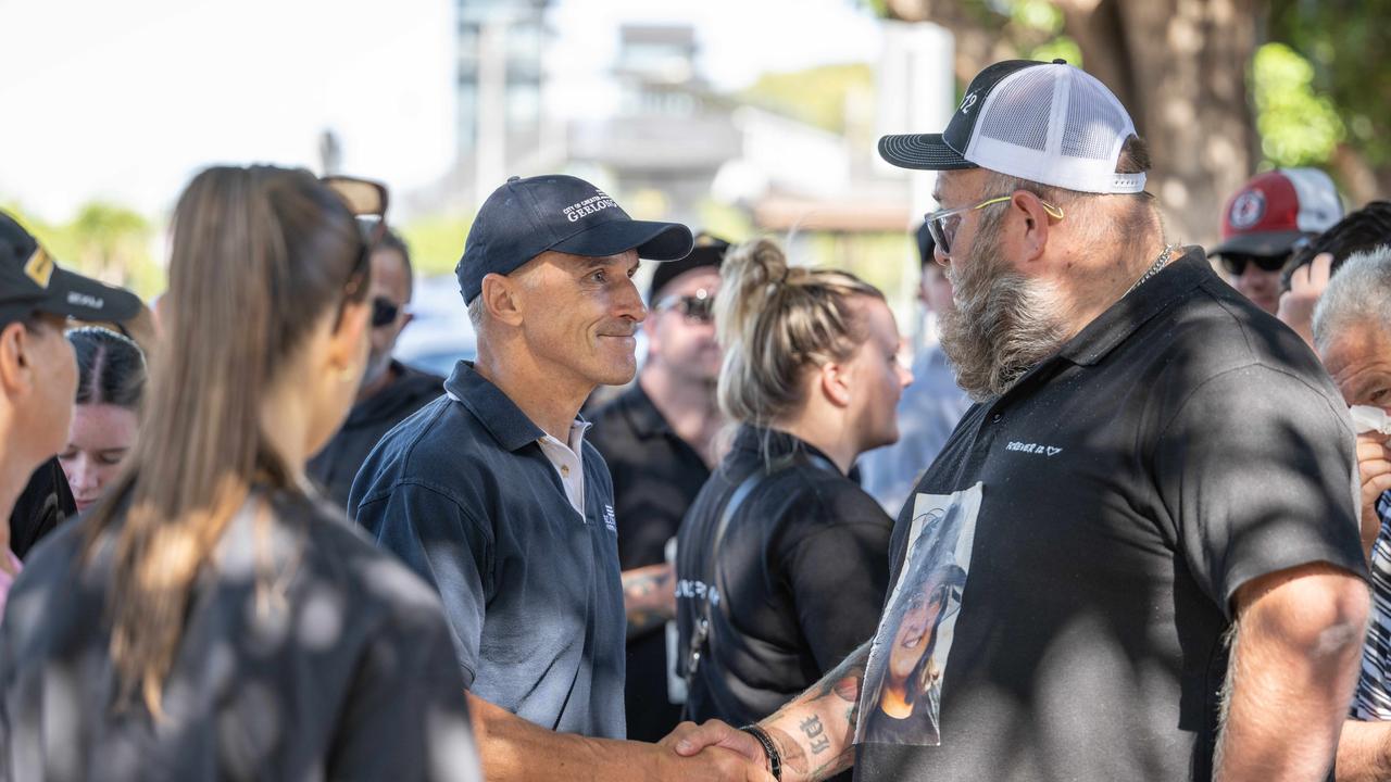 Geelong councillor Eddy Kontelj shakes the hand of Mia’s father Paul Rossiter. Picture: Brad Fleet