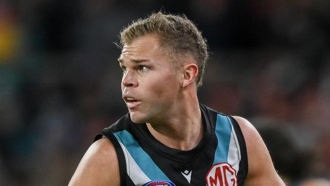 ADELAIDE, AUSTRALIA - AUGUST 03:  Dan Houston of the Power   during the round 21 AFL match between Port Adelaide Power and Sydney Swans at Adelaide Oval, on August 03, 2024, in Adelaide, Australia. (Photo by Mark Brake/Getty Images)