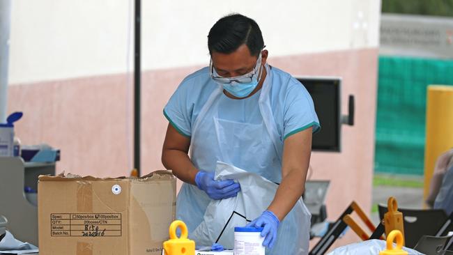 A health worker at the pop-up COVID-19 testing clinic at Royal Prince Alfred Hospital in Sydney's inner west. Picture: NCA NewsWire / Nicholas Eagar