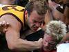  $$ FEES APPLY $$ Hawthorn's Richard Vandenberg (obscured), Lance Picioane #13 and John Barker clashes with Essendon's Adam M...