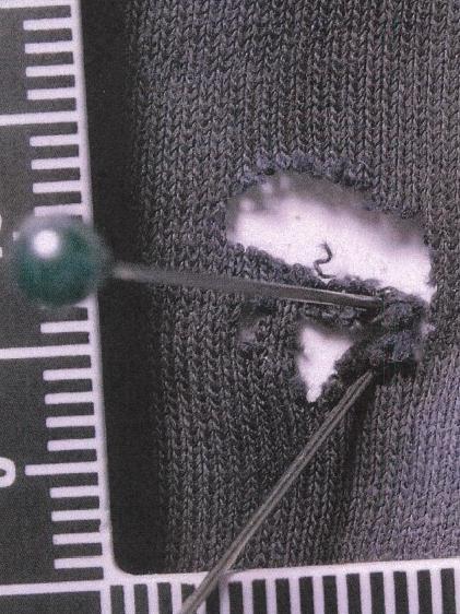 Damage to Zach Rolfe's clothing.Picture: Courts NT