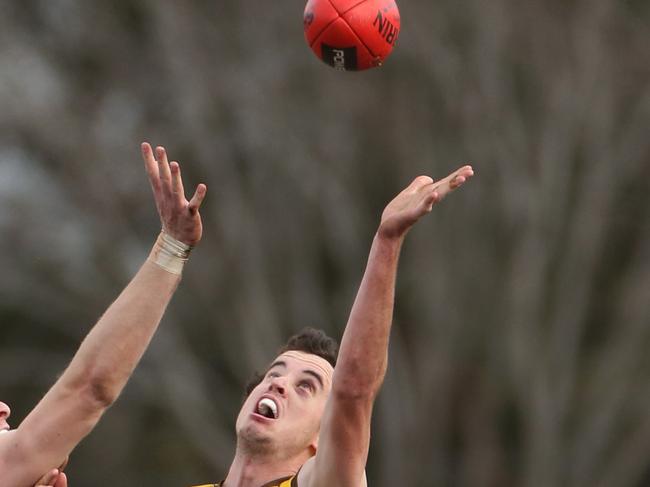 EFL (Division 1) Qualifying Final: Balwyn v Rowville played Bayswater Oval.36 for  Rowville Mitchell Garner in the ruck against Glenn Chivers  for Balwyn.Picture: Stuart Milligan