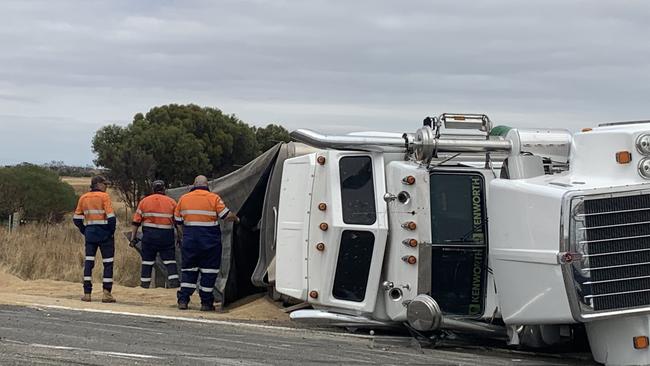 Clean up crews have been at work to remove the truck and its contents from the Highway. Picture: Isaac Selby