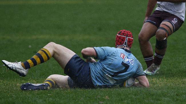 NSW's Harry Davis slides in to score a try against Queensland 2 at the 48th Australian School Rugby Championships at Knox Grammar. Pic: John Appleyard