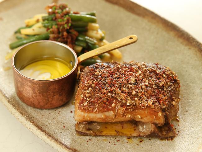 Lamb shoulder pictured at Nour restaurant on Crown Street in Surry Hills.Nour is a casual dining restaurant that has done well on the Delicious Top 100 list for 2017.Picture: Richard Dobson