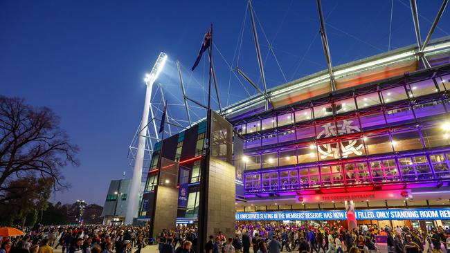 Fans arrive during the 2023 AFL First Semi Final match between the Melbourne Demons and the Carlton Blues at Melbourne Cricket Ground on September 15, 2023 in Melbourne, Australia. (Photo by Dylan Burns/AFL Photos via Getty Images)