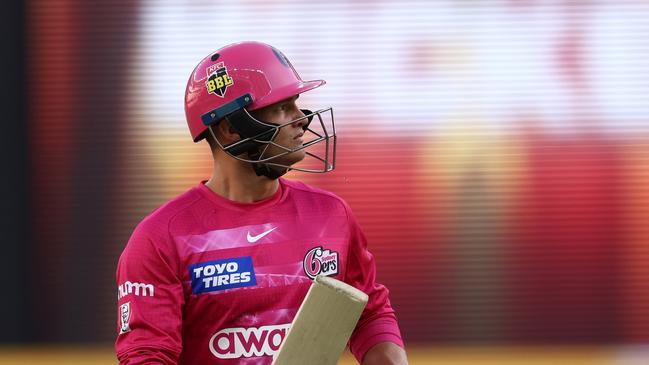 PERTH, AUSTRALIA - DECEMBER 17: Josh Philippe of the Sixers walks from the field after being dismissed during the Men's Big Bash League match between the Perth Scorchers and the Sydney Sixers at Optus Stadium, on December 17, 2022, in Perth, Australia. (Photo by Paul Kane/Getty Images)