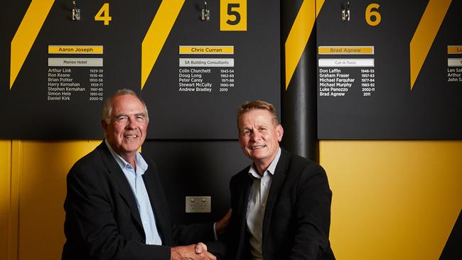 Peter Carey and Nick Chigwidden at Glenelg Football Club. Carey will take over the presidency after a handshake agreement. Picture: MATT LOXTON