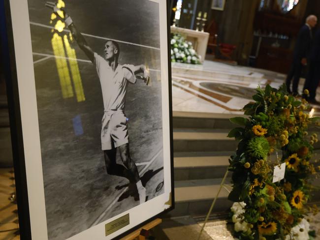 Nineteen-time grand slam winner and four-time Davis Cup winning captain Neale Fraser is farewelled at a state funeral in Melbourne. Picture: Getty Images