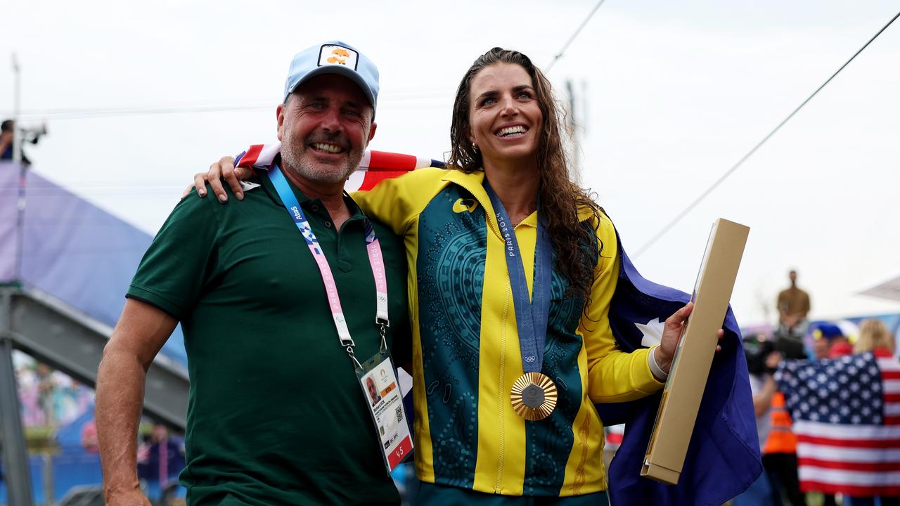 Jess Fox with her coach, and father, Richard Fox. Picture: Alex Davidson/Getty Images