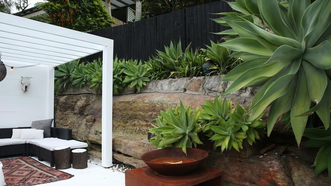 Outdoor entertaining terrace with fire-pit. Alexandra Smart, one half of designer fashion label Ginger + Smart, at her home in Neutral Bay on Sydney's lower North Shore. Britta Campion / The Australian