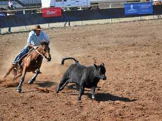 DUST: Jay Pearce and his horse leave a trail of dust during the novice B final. Picture: Molly Hancock