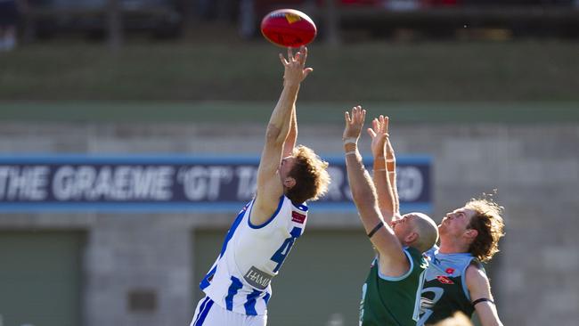 Ayden Gras flies for a mark against Geelong Amateur. Picture: Phil Yeo