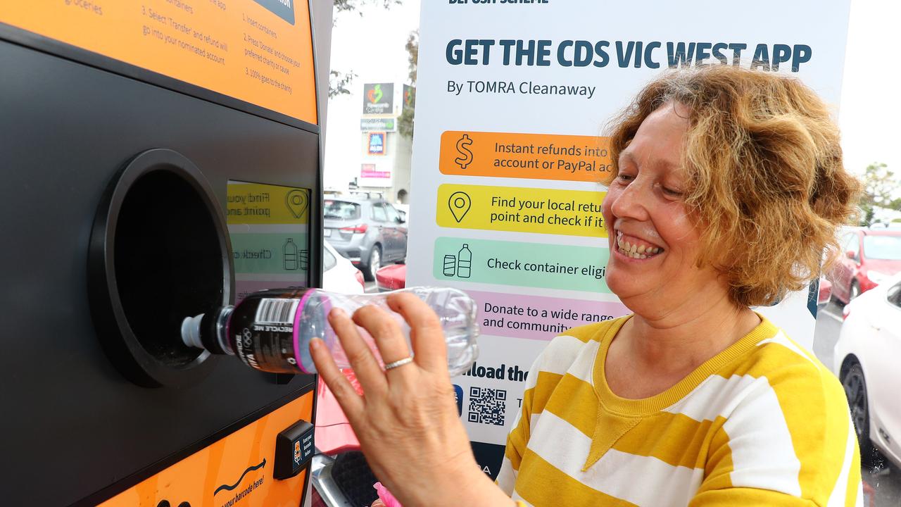 Resident Joanne Campbell recycled seven garbage bags of cans and bottles in return for around $100 on the first day of the Victorian container deposit scheme. Picture: Alison Wynd