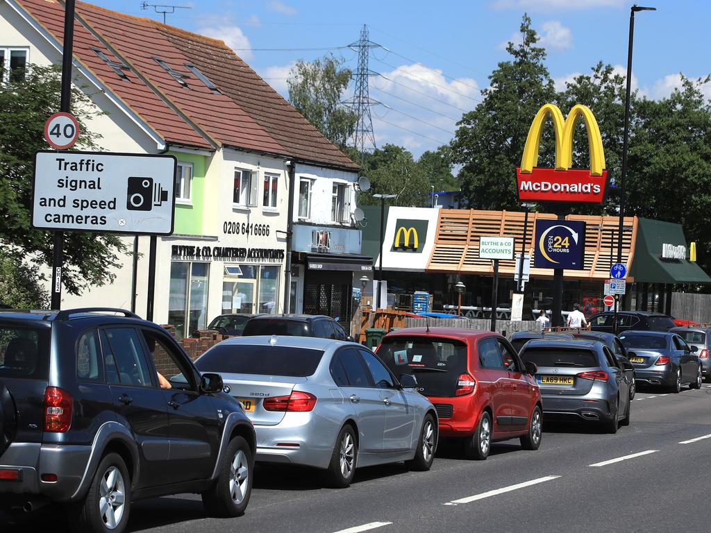 Cars queue at a Drive Thru McDonald's in Sutton, England. Picture: Andrew Redington/Getty Images