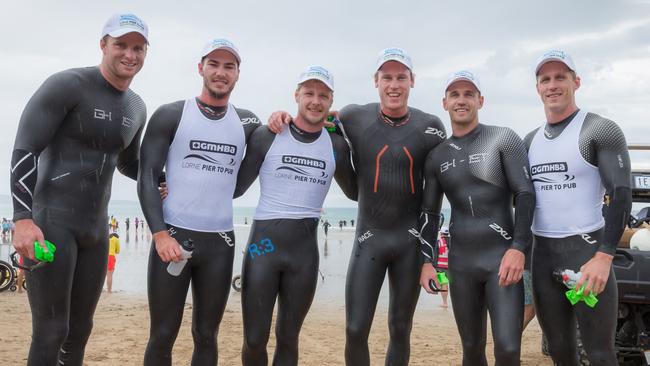 (From left) Lachie Henderson, Jackson Thurlow, George Horlin-Smith, Mark Blicavs, Joel Selwood and Scott Selwood after swimming the Pier to Pub in Lorne.