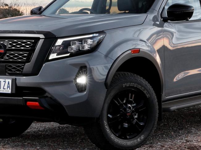 Nissan's Navara Pro-4X sites atop of the range with features including bulging black wheel arches with red highlights house robust all-terrain tyres, while behind the cabin there's a black sports bar with side sail planes.