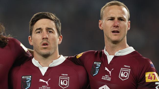 SYDNEY, AUSTRALIA - JULY 12:   Tino Fa'asuamaleaui, Ben Hunt and Daly Cherry-Evans of the Maroons stand and sing the national anthem during game three of the State of Origin series between New South Wales Blues and Queensland Maroons at Accor Stadium on July 12, 2023 in Sydney, Australia. (Photo by Mark Kolbe/Getty Images)