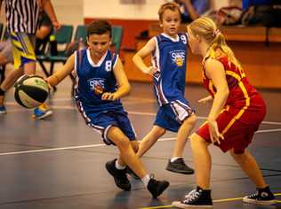 Cody Fitzpatrick eludes Grace Hughes while Ben Dibsdale-Godwin watches on. Picture: Miguel Galy