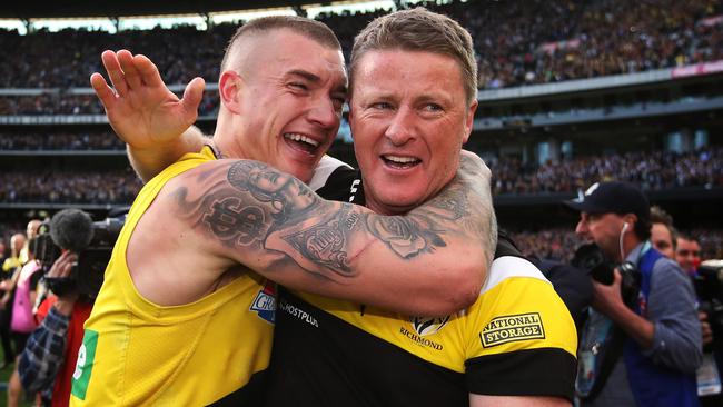 Dustin Martin and coach Damien Hardwick celebrate after the final siren after Richmond defeated the Adelaide Crows in the 2017 AFL Grand Final at the MCG. Picture. Phil Hillyard