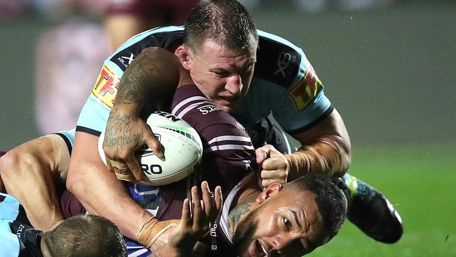 Manly's Addin Fonua-Blake tackled by Cronulla's Paul Gallen during the NRL Elimination Final match between the two sides at Lottoland. Picture. Phil Hillyard