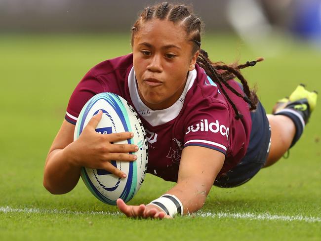 BRISBANE, AUSTRALIA - FEBRUARY 29: Destiny Brill of the Reds scores a try during the round three SuperW match between the Reds and the Rebels at Suncorp Stadium on February 29, 2020 in Brisbane, Australia. (Photo by Chris Hyde/Getty Images)