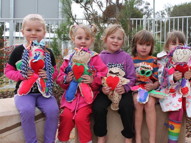 GIRLS CLUB: Charlize Taylor, Kera Reeve, Keely Clear-Buckland, Jorja Lowe and Elloise Sanders show off the dolls they are making for Jumpers and Jazz in July. Photo Georja Ryan / Warwick Daily News