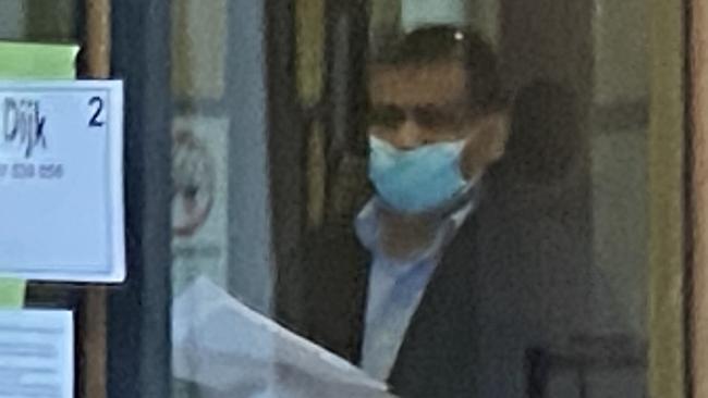 Dentist Bassem Fouad attempted to dodge media on multiple occasions. Picture: Ashleigh Tullis