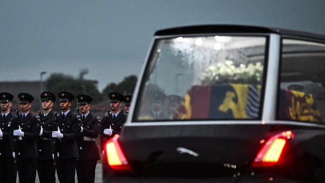 The coffin of Queen Elizabeth II is taken away in the Royal Hearse from the Royal Air Force Northolt air base on Tuesday evening. Picture: Getty Images