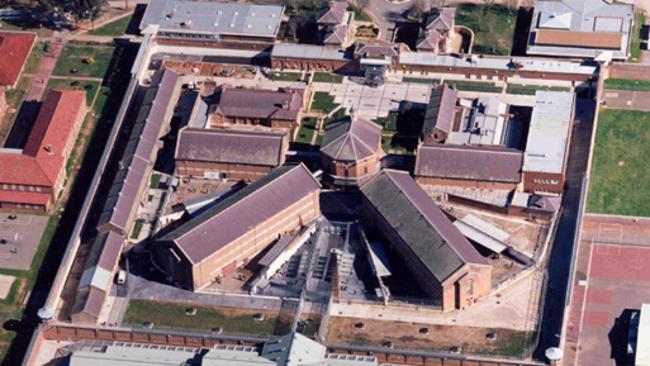 A special barrier has been built at Goulburn Prison (above) since filled celebrity Robert Hughes complained he was being covered in waste and spit. Picture: Corrective Services NSW