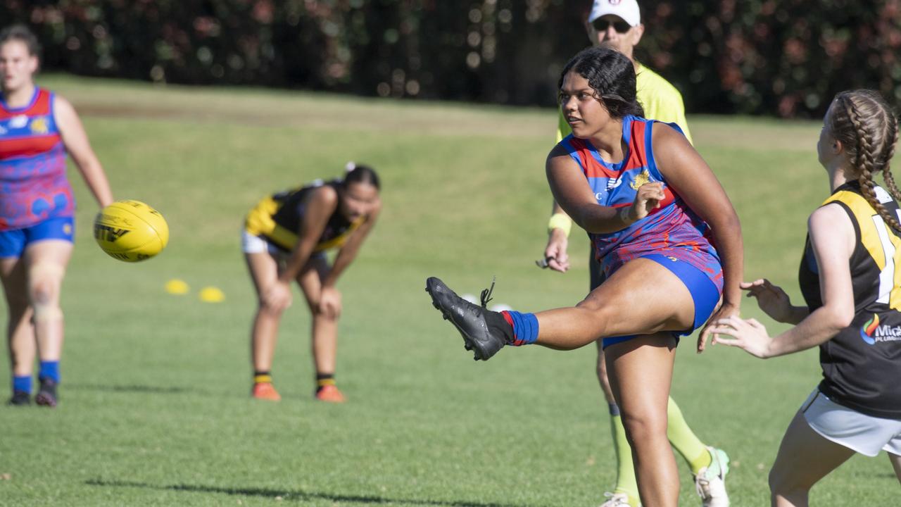 Charlee Lamb kicks for Downlands. Picture: Nev Madsen.