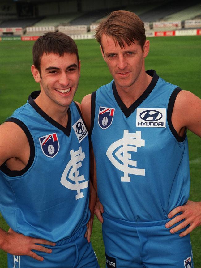 Scott Camporeale and Peter Dean wearing Carlton’s M&amp;M’s promotional jumper.