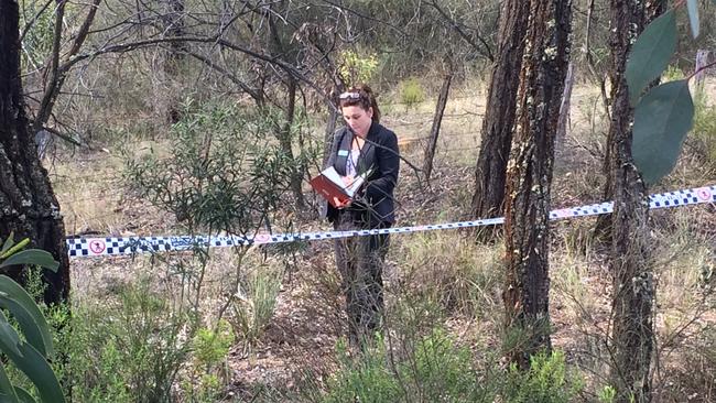 Detectives at the site where Carly McBride's remains were discovered near Scone.