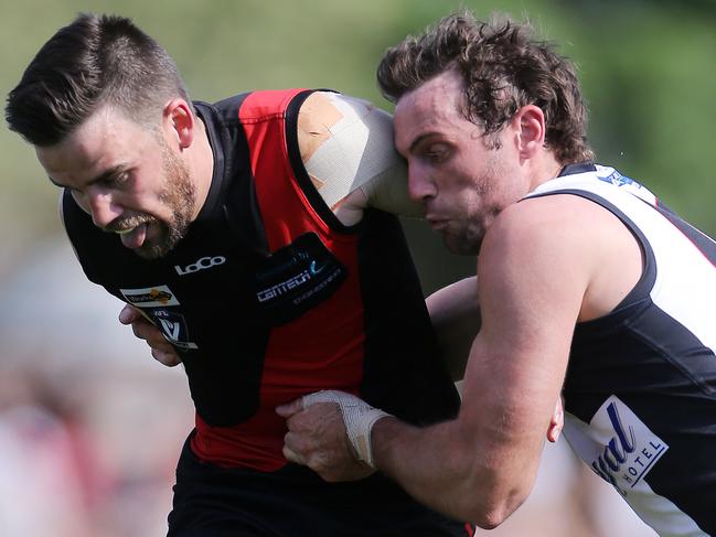 Ryan Emmett gets a kick away for Kyabram. Picture: Yuri Kouzmin