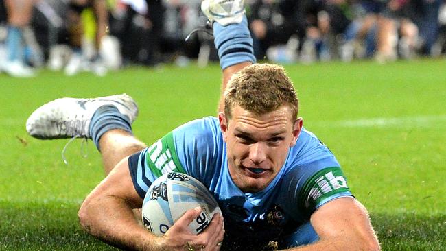 Tom Trbojevic scores off an intercept in the first half.  (Photo by Bradley Kanaris/Getty Images)