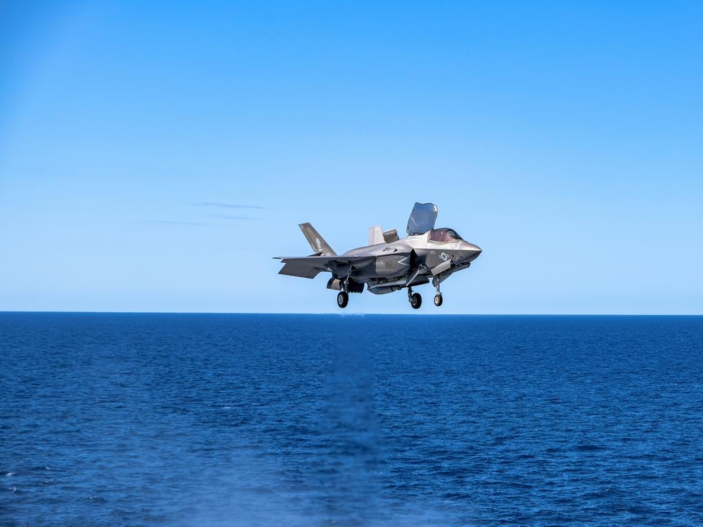 A U.S. Marine Corps F-35B Lightning II with Marine Fighter Attack Squadron 121 attached to Marine Medium Tiltrotor Squadron 265 (Reinforced), 31st Marine Expeditionary Unit (MEU), prepares to land on the flight deck aboard the amphibious assault ship USS America (LHA 6), during Talisman Sabre on July 17, 2021. The F-35B Lightning IIÃ¢â&#130;¬â&#132;¢s fifth generation strike fighter capabilities bring more lethality and flexibility to combat commanders than any other aircraft platform. Australian and U.S. forces combine biannually for Talisman Sabre, a month-long multi-domain exercise that strengthens allied and partner capabilities to respond to the full range of Indo-Pacific security concerns. The 31st MEU is operating aboard ships of America Expeditionary Strike Group in the 7th fleet area of operations to enhance interoperability with allies and partners and serve as a ready response force to defend peace and stability in the Indo-Pacific region. (U.S. Marine Corps photo by Staff Sgt. John Tetrault)