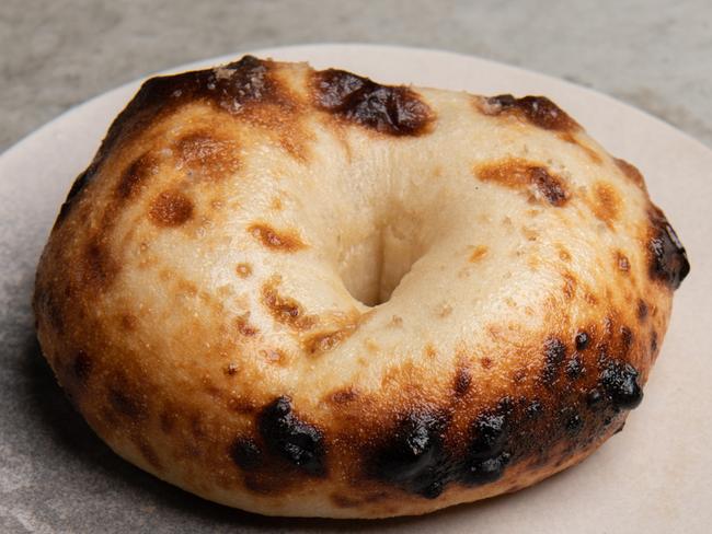 woodfired bagel with buffalo curd and macadamia dukkah